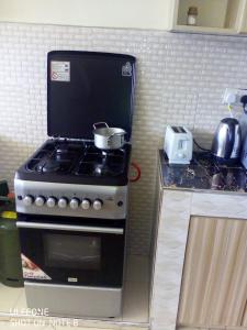 Kuchyň nebo kuchyňský kout v ubytování Top tier A 01