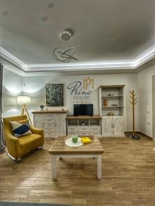 a living room with a couch and a coffee table at Princ house in Leskovac