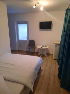 Postel nebo postele na pokoji v ubytování Casa Loro