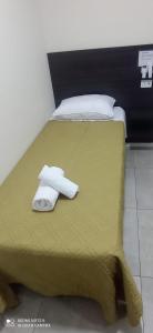 Säng eller sängar i ett rum på Hotel Don Enrique