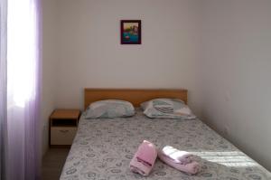 Voodi või voodid majutusasutuse Kadulja apartment toas