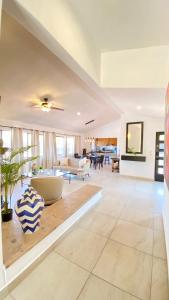 a living room with a couch and a table at San Angel Villas in San Antonio