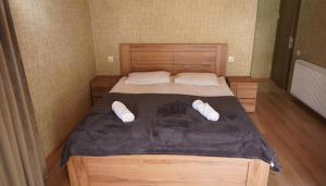 Katil atau katil-katil dalam bilik di Archil and Nino Gigauri Guest House