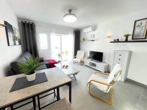 TV a/nebo společenská místnost v ubytování Apartamento Hibiscos, San Juan de Capistrano