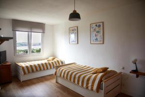 Postel nebo postele na pokoji v ubytování Casa vacacional La Terrona
