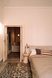 Un pat sau paturi într-o cameră la Allora Bari