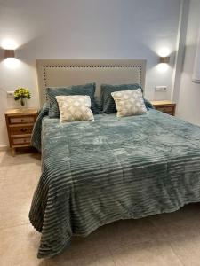 Postel nebo postele na pokoji v ubytování Piso en el corazón de Águilas