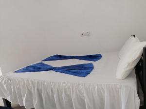 A bed or beds in a room at Hotel Water Nest