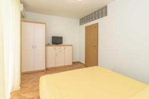 Ein Bett oder Betten in einem Zimmer der Unterkunft Alto Apartments