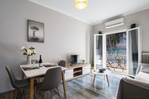 TV a/nebo společenská místnost v ubytování Mencrates Apartment