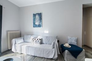Postel nebo postele na pokoji v ubytování Mencrates Apartment