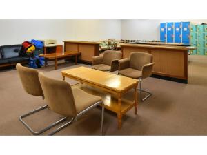 a conference room with chairs and a table and a desk at Hotel Takimoto - Vacation STAY 43487v in Yamanouchi
