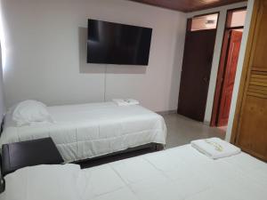 Ένα ή περισσότερα κρεβάτια σε δωμάτιο στο CASA MERCY