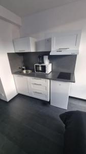A cozinha ou cozinha compacta de L'Elégance 005