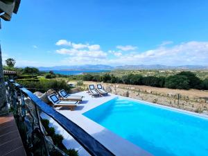 The swimming pool at or close to Villa Capo Coda Cavallo piscina privata
