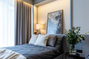 En eller flere senge i et værelse på Monciak Elegance - Molo