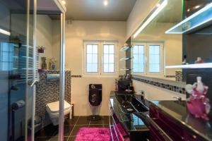 a bathroom with a sink and a toilet in it at CASA RIGOR in Rio Caldo +106 photos