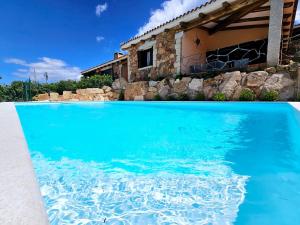The swimming pool at or close to Villa Capo Coda Cavallo piscina privata