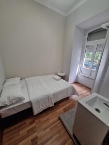 Un pat sau paturi într-o cameră la Residencial Ideal
