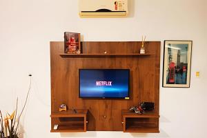 TV a/nebo společenská místnost v ubytování VA Apart Hotel Savassi