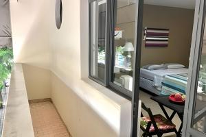 Postel nebo postele na pokoji v ubytování VA Apart Hotel Savassi