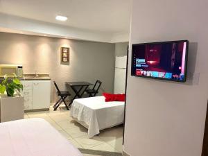 TV a/nebo společenská místnost v ubytování VA Apart Hotel Savassi