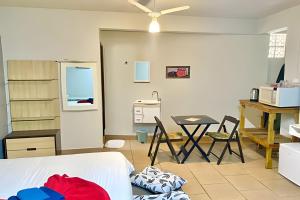 Postel nebo postele na pokoji v ubytování VA Apart Hotel Savassi