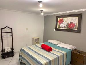 Postel nebo postele na pokoji v ubytování VA Apart Hotel Savassi