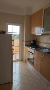 Η κουζίνα ή μικρή κουζίνα στο Stela ' s Guest House