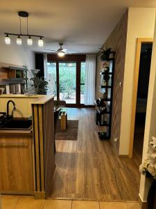 a kitchen with a sink and a counter top at Exclusive Central Apartment with Private Garden in Budapest +8 photos