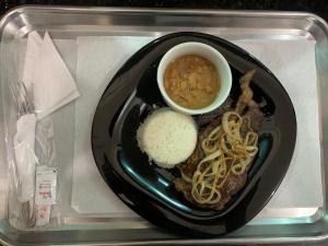 a plate of food with noodles and a bowl of soup at Prestige Motel 4 in Sorocaba +4 photos