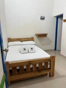 Кровать или кровати в номере Nativo Hostel Venecia