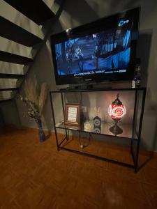 Et tv og/eller underholdning på Departamentos PRANA C con COCHERA