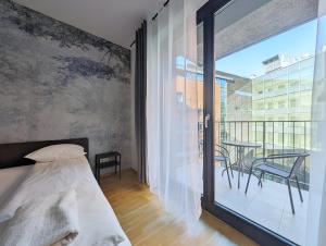 Turnau City Aparthotel客房内的一张或多张床位