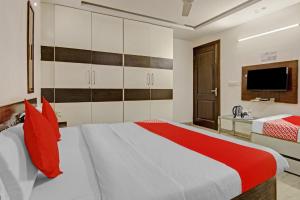 Llit o llits en una habitació de Collection 81027 Soni Inn