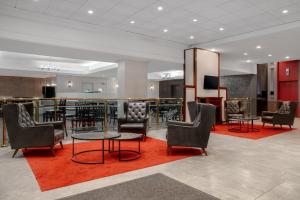 The lobby or reception area at Ramada Plaza by Wyndham Calgary Downtown