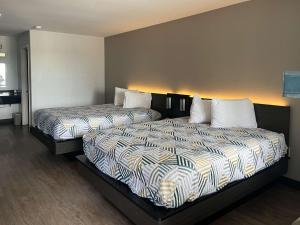 Postel nebo postele na pokoji v ubytování Motel 6 Seguin TX