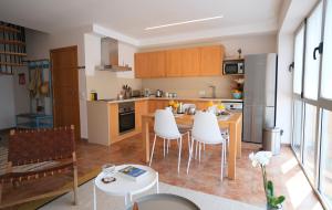 Kuchyň nebo kuchyňský kout v ubytování Sunny Home Canteras Beach
