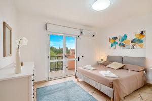 Postel nebo postele na pokoji v ubytování La Casa dei Sogni