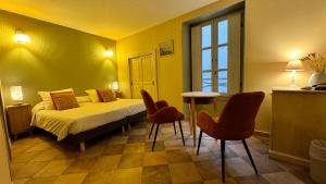 Colomba Hôtel Centre-Ville Historique客房内的一张或多张床位