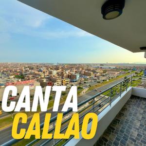 un balcón con vistas a la ciudad con las palabras cana califa en Bonito departamento VIP estreno en Condominio, en Lima