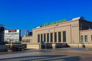 a large building with a sign on top of it at MIMARU Tokyo Ueno East in Tokyo
