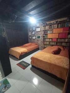 Llit o llits en una habitació de Lego-legona Bulubarakka