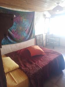 Ένα ή περισσότερα κρεβάτια σε δωμάτιο στο Cabaña las florcitas