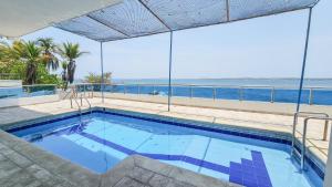 Bazén v ubytování El Laguito Cartagena - Apartamento 2 habitaciones acceso directo a playa nebo v jeho okolí