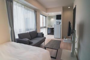 TV a/nebo společenská místnost v ubytování Star Residence - 博多上呉服