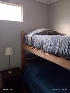Krevet ili kreveti na kat u jedinici u objektu Alojamiento jv CABAÑA