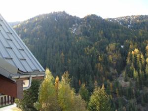 a view of a forest of trees on a mountain at Appartement Valfréjus, 3 pièces, 8 personnes - FR-1-561-112 in Modane