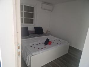Postel nebo postele na pokoji v ubytování Delices du Papillon