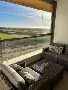 Гостиная зона в Tamraght golf sea view , pool, beach access